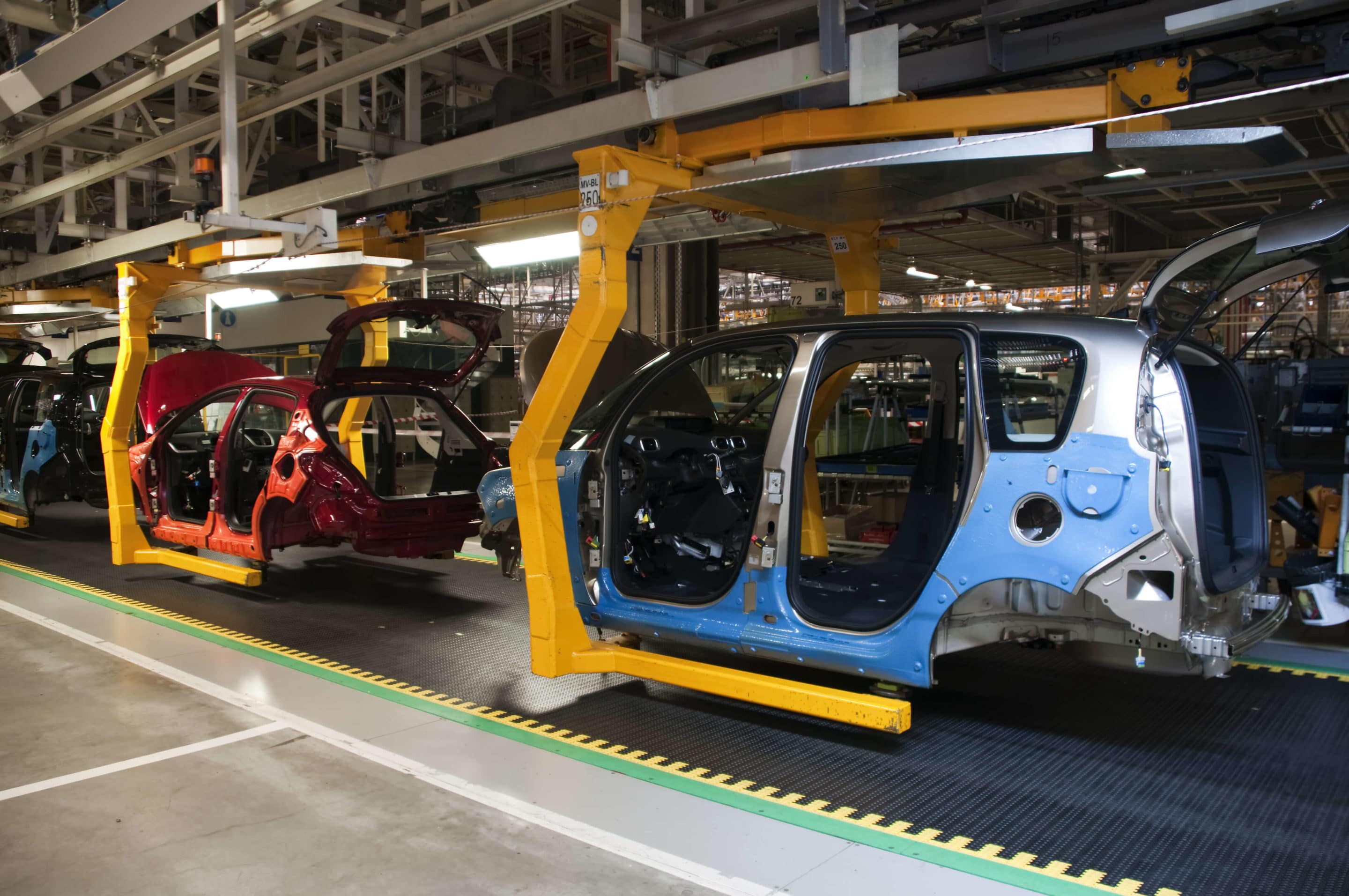 An Assembly line of red and blue cars in a manufacturing execution system